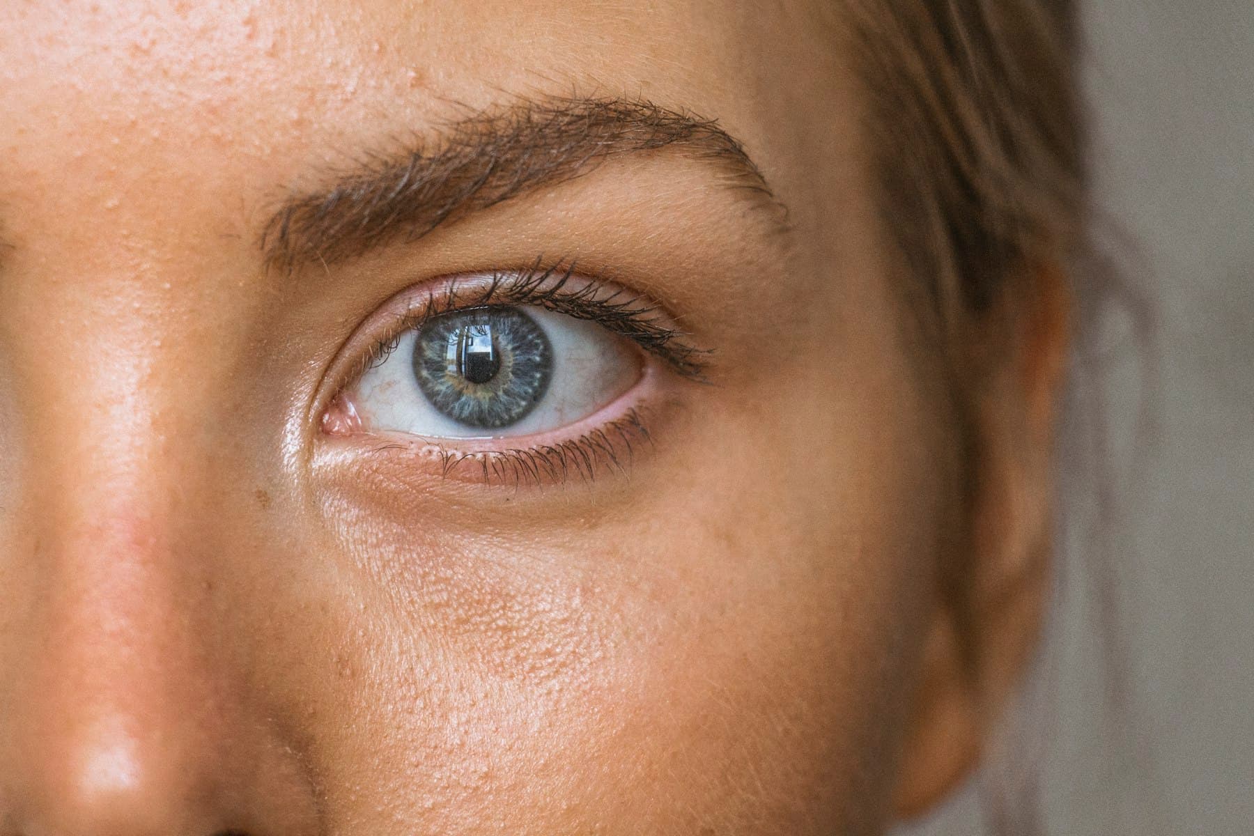 Close-up of a natural, softly shaped brow