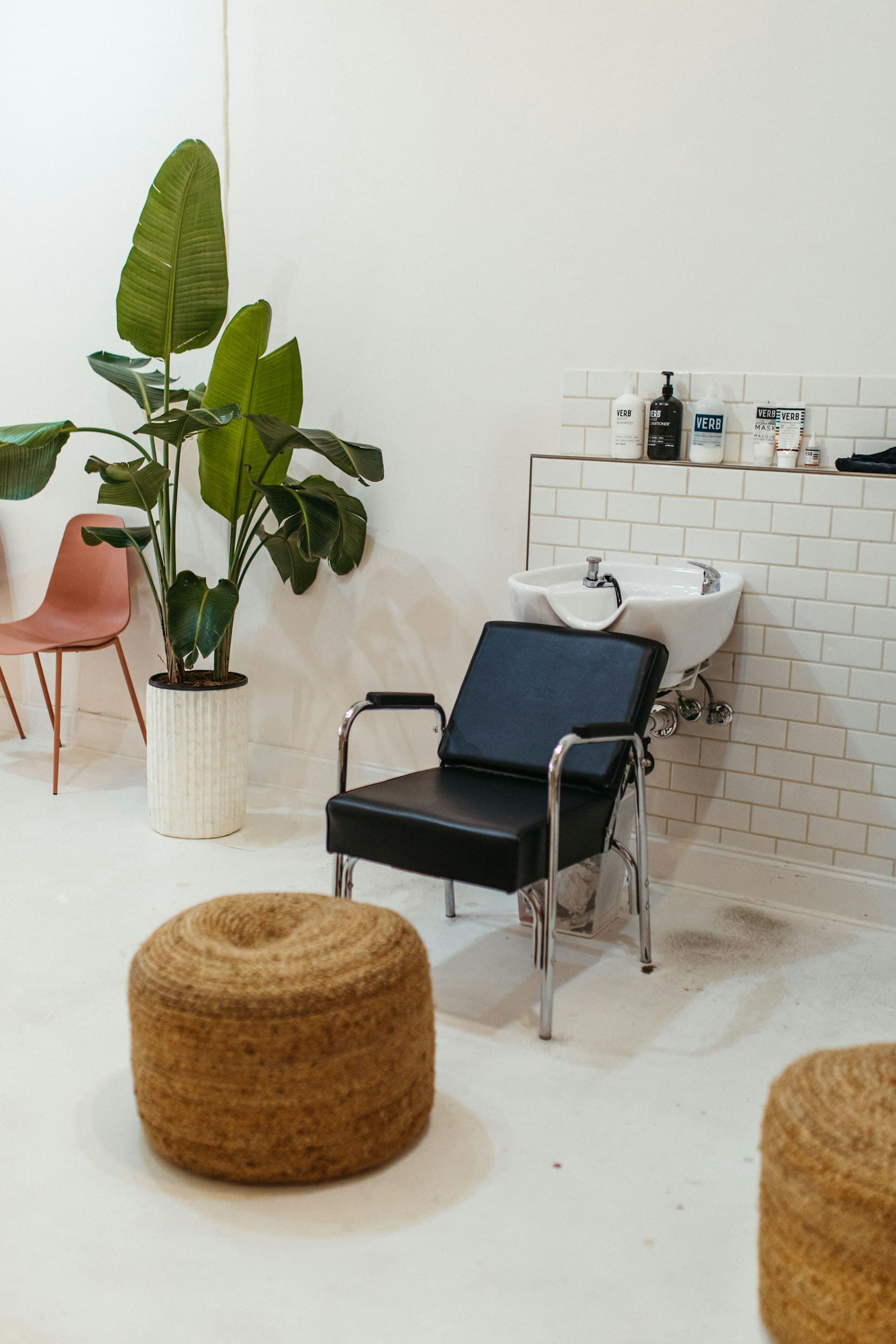 Inside Linden Brow Studio, a calm treatment room with a bed and warm light