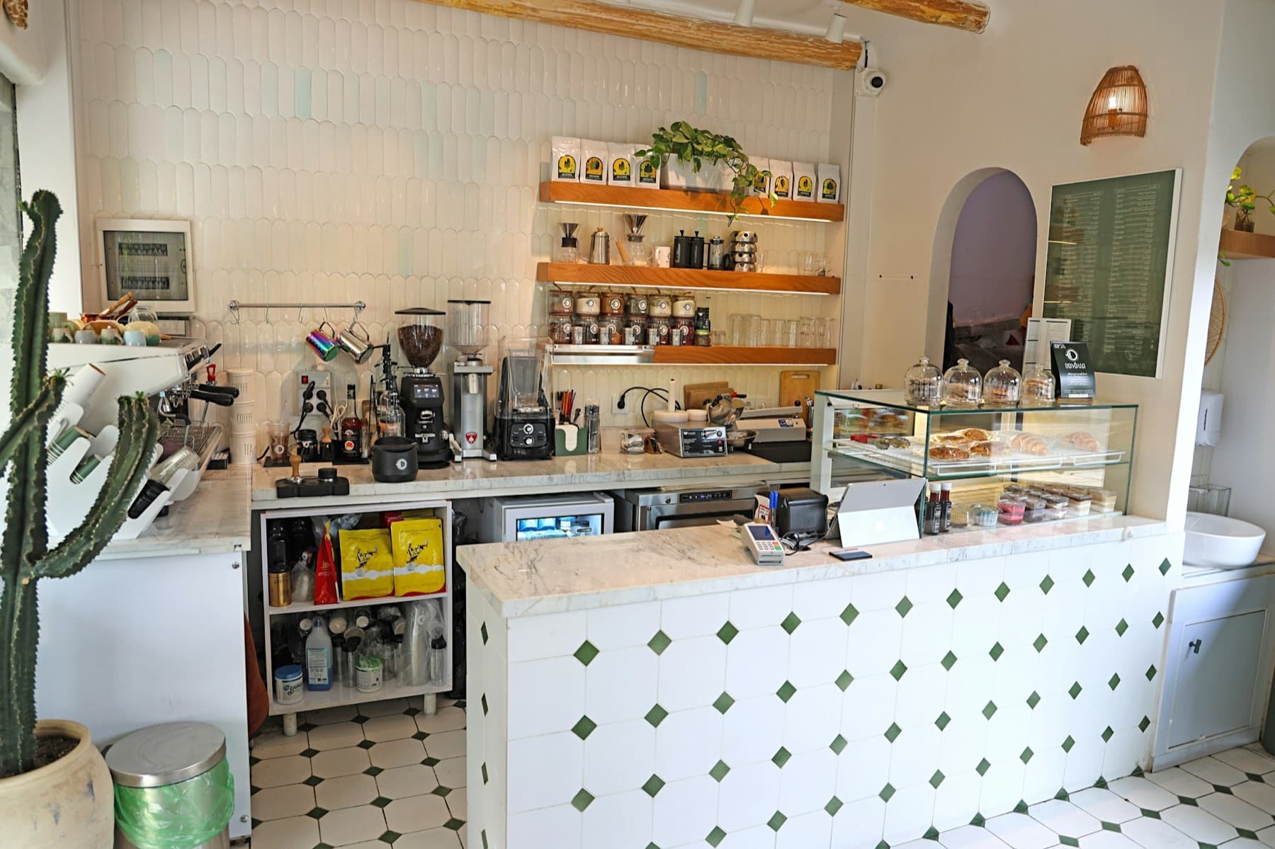 Counter with a glass cabinet of baked goods
