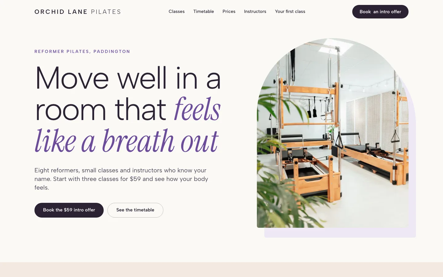 The Orchid Lane Pilates example site on a laptop screen